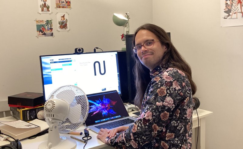 Person sitting in front of computer.