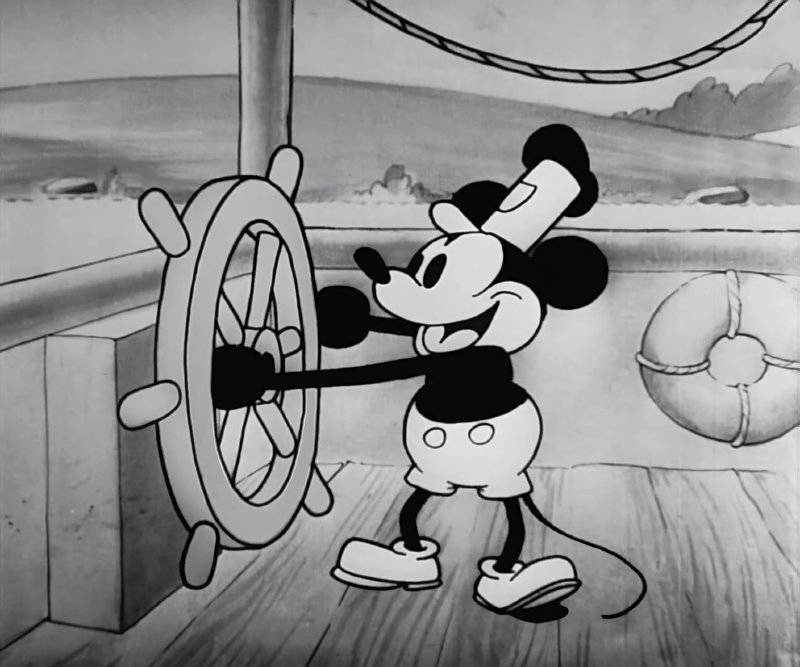 cartoon mouse steering a ship