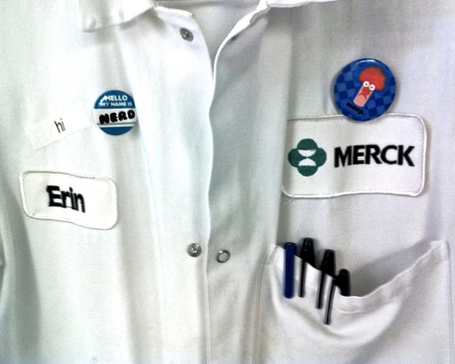 Hi my name is nerd Picture of scientist shirt with a button saying my name is nerd