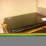 Here's another photo of my server sitting on top of some books to get better airflow. Photo auto-garbled by my nifty phone.