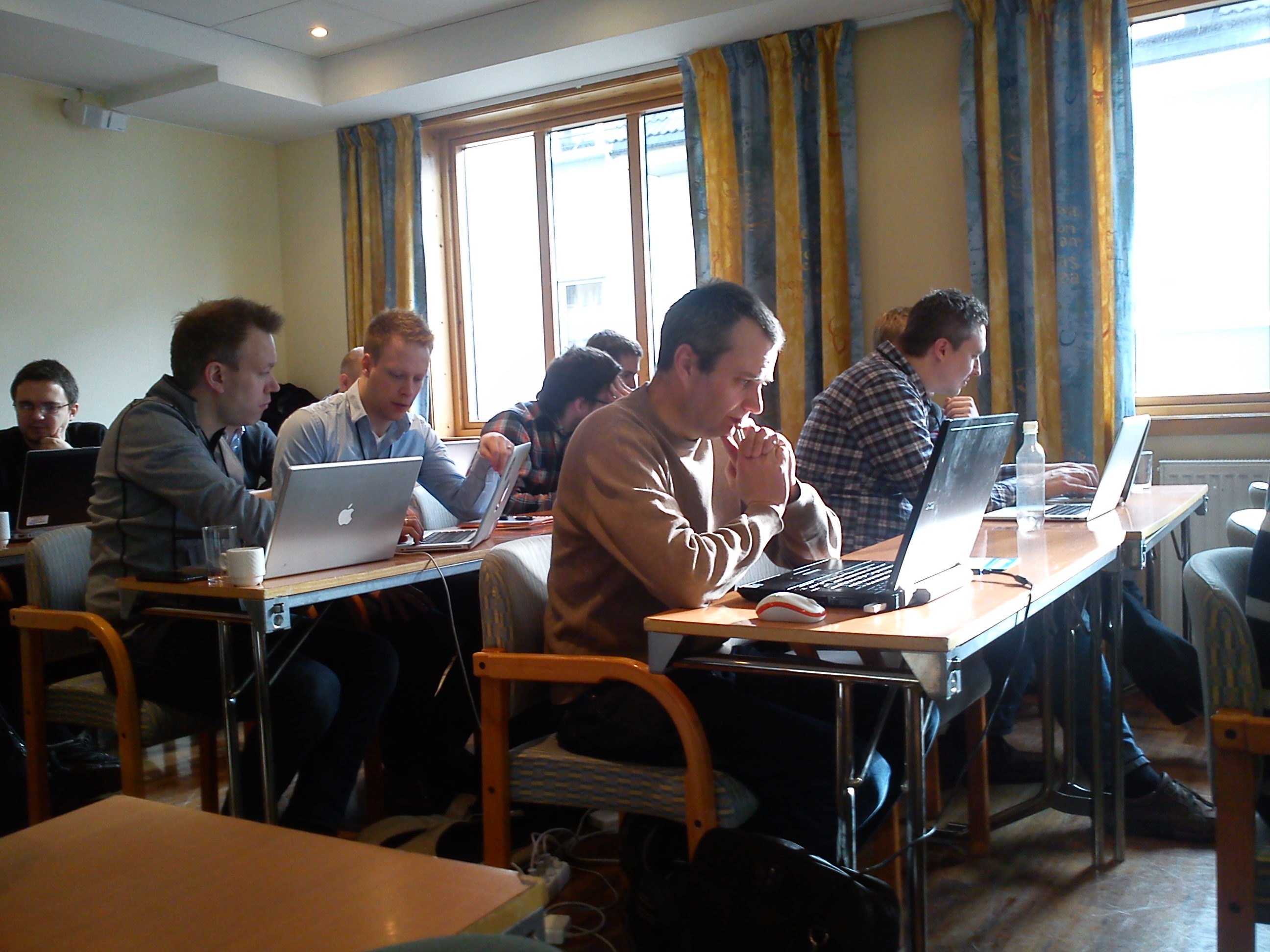 People solving a coding kata through pair programming