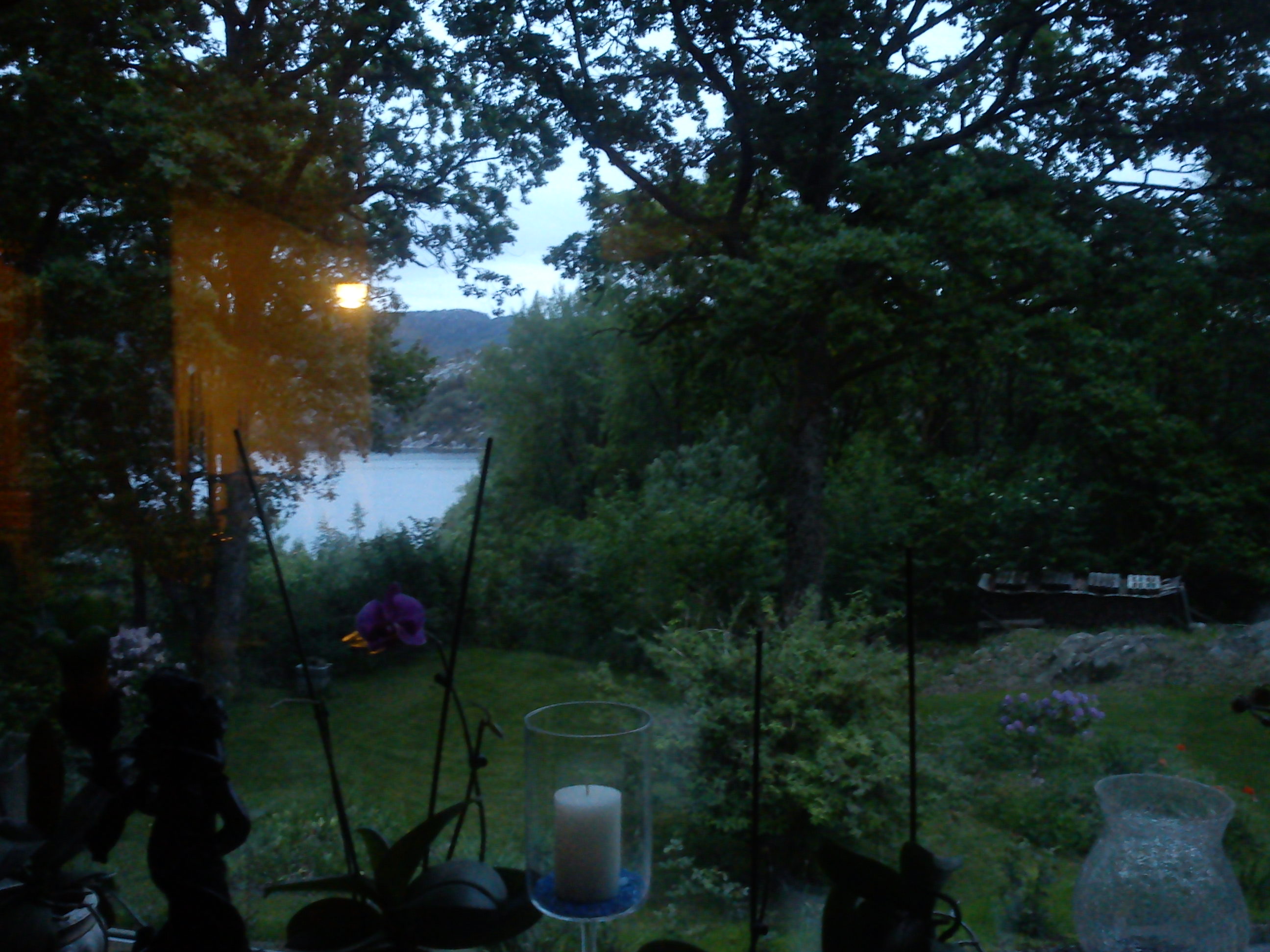 seeing the fjord in the distance dimly lit